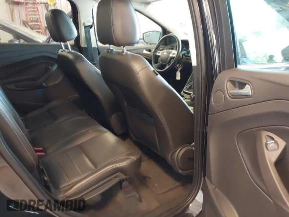 2014 Ford Escape SE with VIN 1FMCU9G95EUA16328, listed as a IAAI auction lot 42464235 with 108,570 mi miles and . Bid and sale history available at DreamBid. Image 8.