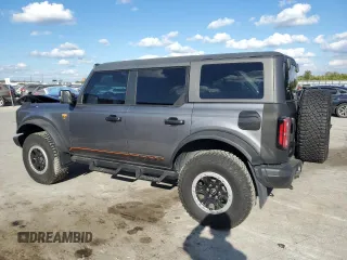 2022 Ford Bronco with VIN 1FMEE5DH1NLB82717, listed as a Copart auction lot 83230614 with 21,593 mi miles and Salvage Title. Bid and sale history available at DreamBid. Image 2.