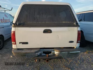 2000 Ford F-350 XL with VIN 1FTSW30S6YEC82315, listed as a Copart auction lot 75479334 with 327,345 mi miles and Salvage Title. Bid and sale history available at DreamBid. Image 6.