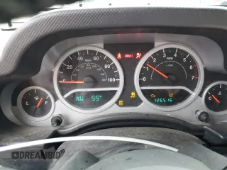 2008 Jeep Wrangler Sahara with VIN 1J4FA54148L561961, listed as a Copart auction lot 50770895 with 126,516 mi miles and Salvage title. Bid and sale history available at DreamBid. Image 9.