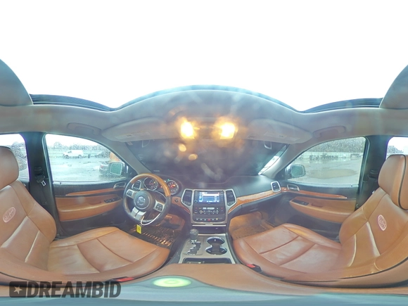2013 Jeep Grand Cherokee Overland with VIN 1C4RJECT2DC590911, listed as a Copart auction lot 42939405 with 136,673 mi miles and Salvage Title. Bid and sale history available at carsss.com. Image 13.
