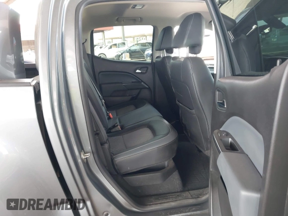 2021 Chevrolet Colorado 4WD Z71 z VIN 1GCGTDEN1M1168618, wystawiony jako IAAI lot #41683565 z przebiegiem 57 697 mil mil oraz . Historia ofert i sprzedaży dostępna na DreamBid. Obrazek 8.