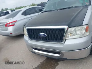 2006 Ford F-150 STX with VIN 1FTRX12W06FA33922, listed as a IAAI auction lot 41927462 with 256,709 mi miles. Bid and sale history available at carsss.com. Image 6.