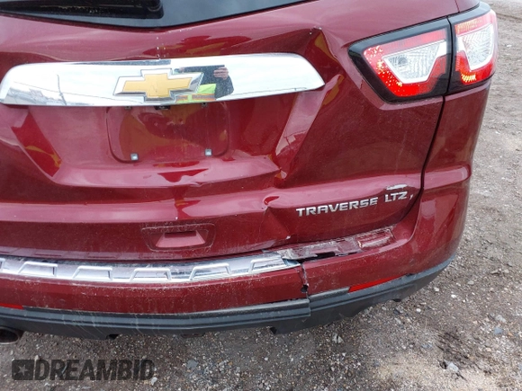 2016 Chevrolet Traverse LTZ z VIN 1GNKVJKD8GJ167038, wystawiony jako IAAI lot #41878254 z przebiegiem 159 771 mil mil oraz . Historia ofert i sprzedaży dostępna na DreamBid. Obrazek 6.