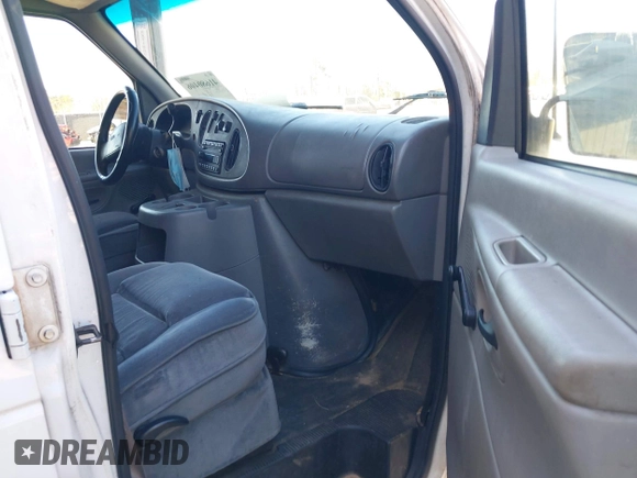 1999 Ford Econoline Cargo with VIN 1FTRE1429XHC29847, listed as a IAAI auction lot 41680406 with 262,002 mi miles. Bid and sale history available at carsss.com. Image 5.