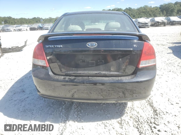 2009 Kia Spectra SX with VIN KNAFE221X95614791, listed as a Copart auction lot 75534254 with 195,288 mi miles and Salvage Title. Bid and sale history available at carsss.com. Image 6.