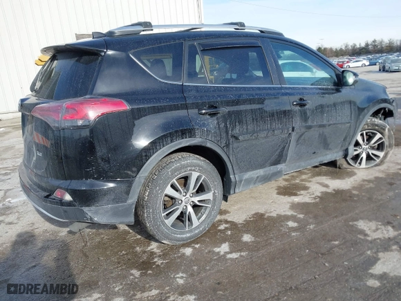 2016 Toyota RAV4 XLE with VIN 2T3WFREV7GW255784, listed as a IAAI auction lot 41266085 with 87,426 mi miles. Bid and sale history available at carsss.com. Image 4.