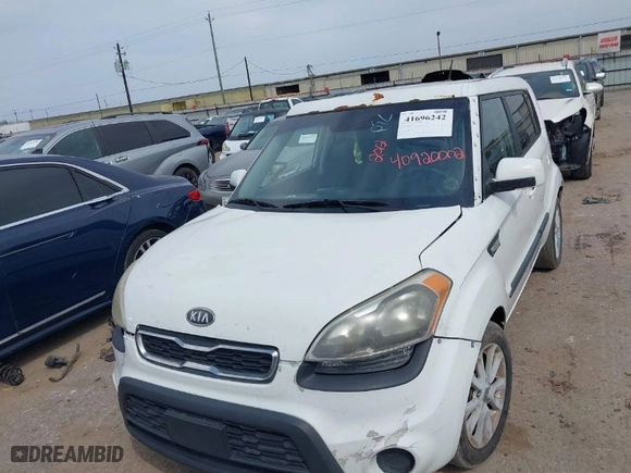 2012 Kia Soul with VIN KNDJT2A58C7357357, listed as a IAAI auction lot 41696242 with 222,593 mi miles. Bid and sale history available at carsss.com. Image 6.