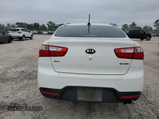 2015 Kia Rio EX with VIN KNADN4A32F6424365, listed as a Copart auction lot 70862234 with 87,586 mi miles and Salvage Title. Bid and sale history available at carsss.com. Image 6.