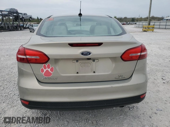 2016 Ford Focus SE z VIN 1FADP3F20GL267077, wystawiony jako Copart lot #53649665 z przebiegiem 106 329 mil mil oraz Szkoda całkowita • Salvage title. Historia ofert i sprzedaży dostępna na DreamBid. Obrazek 6.