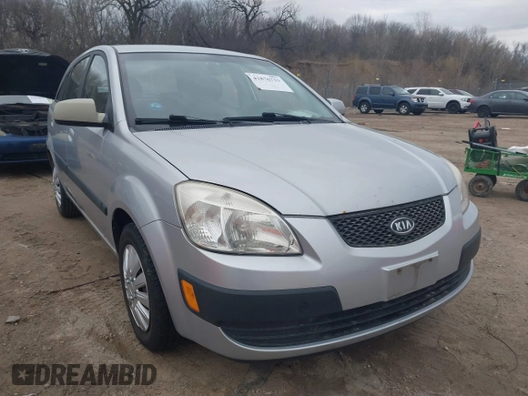 2009 Kia Rio LX with VIN KNADE243596544181, listed as a IAAI auction lot 41876733 with 200,216 mi miles. Bid and sale history available at carsss.com. Image 1.