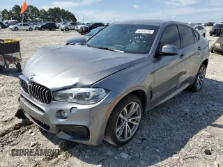 2016 BMW X6 xDrive50i with VIN 5UXKU6C52G0S82464, listed as a Copart auction lot 63145703 with 80,064 mi miles. Bid and sale history available at carsss.com. Image 1.