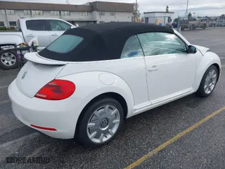 2013 Volkswagen Beetle Convertible 2.5L with VIN 3VW5P7AT9DM825439, listed as a IAAI auction lot 41760907 with 53,649 mi miles. Bid and sale history available at carsss.com. Image 4.