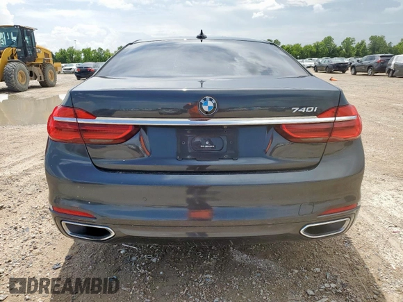 2016 BMW 7 Series 740i with VIN WBA7E2C57GG714564, listed as a Copart auction lot 64005965 with 111,598 mi miles and Salvage title. Bid and sale history available at DreamBid. Image 6.