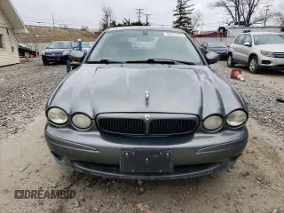 2004 Jaguar X-Type with VIN SAJEA51C24WE00125, listed as a Copart auction lot 49161875 with 80,890 mi miles and Clean Title. Bid and sale history available at DreamBid. Image 5.