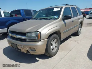 2004 Chevrolet TrailBlazer LS with VIN 1GNDT13S842332717, listed as a IAAI auction lot 41970692 with 261,212 mi miles. Bid and sale history available at carsss.com. Image 2.