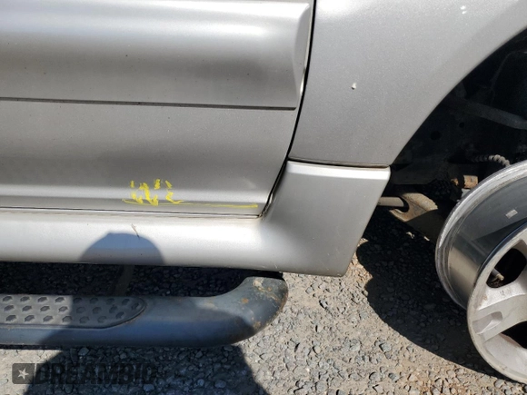 2004 Ford Explorer Sport Trac XLS z VIN 1FMDU77K24UA03885, wystawiony jako Copart lot #75434684 z przebiegiem Nie podano mil oraz Szkoda całkowita • Salvage title. Historia ofert i sprzedaży dostępna na DreamBid. Obrazek 12.