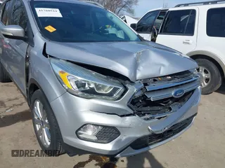 2017 Ford Escape Titanium with VIN 1FMCU0JD3HUB13234, listed as a IAAI auction lot 41760944 with 113,361 mi miles. Bid and sale history available at carsss.com. Image 6.
