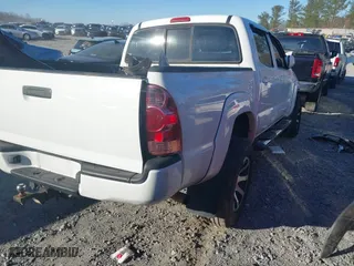 2008 Toyota Tacoma PreRunner with VIN 3TMJU62N58M062894, listed as a IAAI auction lot 41231086 with 300,671 mi miles. Bid and sale history available at carsss.com. Image 4.