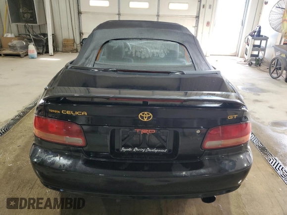 1997 Toyota Celica GT z VIN JT5FG02T3V0041206, wystawiony jako Copart lot #54601725 z przebiegiem 198 685 mil mil oraz Szkody całkowita. Historia ofert i sprzedaży dostępna na DreamBid. Obrazek 6.