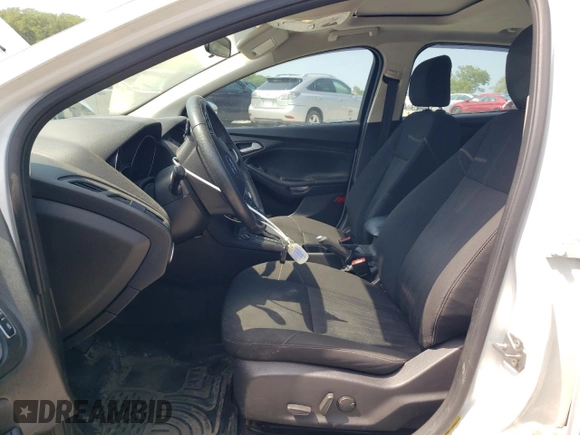 2015 Ford Focus SE with VIN 1FADP3F28FL332899, listed as a Copart auction lot 60055185 with 76,948 mi miles and Clean title. Bid and sale history available at DreamBid. Image 7.
