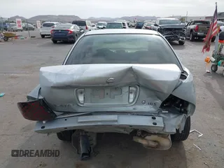 2004 Nissan Sentra S z VIN 3N1CB51D64L476464, wystawiony jako IAAI lot #41893404 z przebiegiem 112 030 mil mil oraz . Historia ofert i sprzedaży dostępna na DreamBid. Obrazek 16.