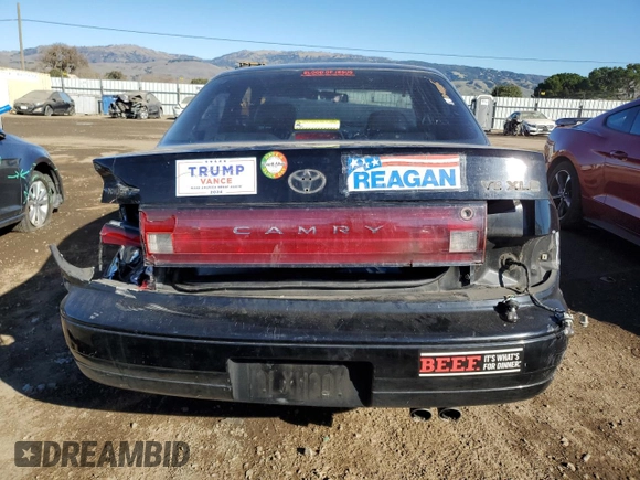 1994 Toyota Camry XLE with VIN JT2GK13E9R0057812, listed as a Copart auction lot 88704015 with 153,621 mi miles and Salvage Title. Bid and sale history available at carsss.com. Image 6.