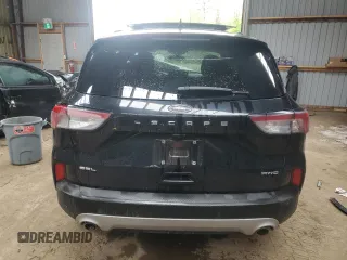 2021 Ford Escape SEL с VIN 1FMCU9H61MUA41424, выставлен на аукционе Copart как лот 57634055 с пробегом 145 286 миль миль и Списание • Salvage title. История ставок и продаж доступна на DreamBid. Изображение 6.