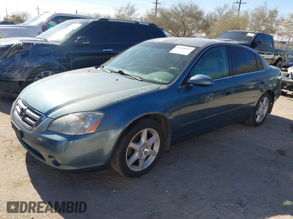 2002 Nissan Altima SE with VIN 1N4BL11D72C700998, listed as a IAAI auction lot 41369017 with 117,148 mi miles. Bid and sale history available at carsss.com. Image 17.