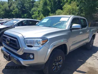 2023 Toyota Tacoma SR with VIN 3TYCZ5AN2PT141576, listed as a IAAI auction lot 42492127 with 43,431 mi miles and . Bid and sale history available at DreamBid. Image 18.