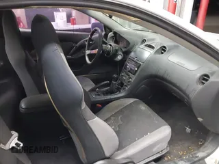 2004 Toyota Celica GT z VIN JTDDR32TX40167973, wystawiony jako IAAI lot #41458284 z przebiegiem 203 384 mil mil oraz . Historia ofert i sprzedaży dostępna na DreamBid. Obrazek 5.