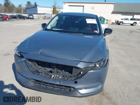 2021 Mazda CX-5 Touring with VIN JM3KFBCM0M0489644, listed as a IAAI auction lot 41756117 with 67,365 mi miles. Bid and sale history available at carsss.com. Image 6.