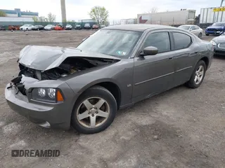 2010 Dodge Charger SXT with VIN 2B3CA3CV7AH165769, listed as a IAAI auction lot 42038135 with 200,886 mi miles. Bid and sale history available at carsss.com. Image 2.