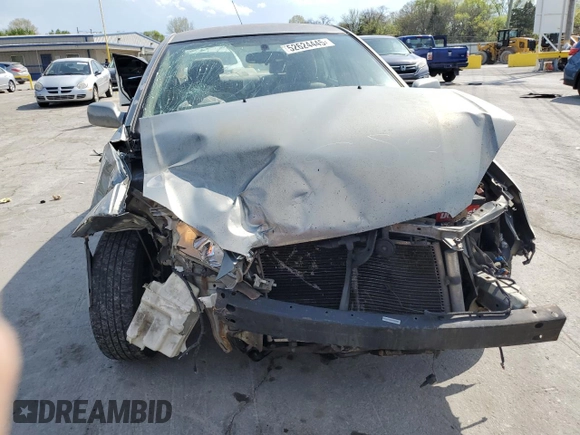 2004 Toyota Corolla CE with VIN 1NXBR32E74Z240293, listed as a Copart auction lot 52624445 with 299,999 mi miles and Salvage Title. Bid and sale history available at DreamBid. Image 5.