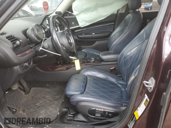 2016 MINI Clubman z VIN WMWLN5C56G2B28065, wystawiony jako Copart lot #54565825 z przebiegiem 129 270 mil mil oraz Szkoda całkowita • Salvage title. Historia ofert i sprzedaży dostępna na DreamBid. Obrazek 7.