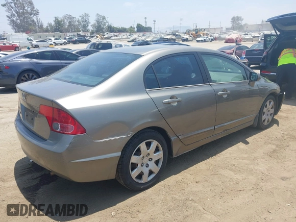2006 Honda Civic LX with VIN 1HGFA16536L102529, listed as a IAAI auction lot 42560525 with 69,698 mi miles and . Bid and sale history available at DreamBid. Image 4.