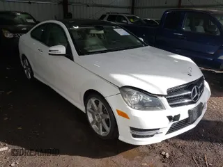 2014 Mercedes-Benz C-Class C 250 with VIN WDDGJ4HB2EG189862, listed as a IAAI auction lot 41745936 with 113,797 mi miles. Bid and sale history available at carsss.com. Image 1.