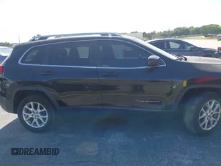 2015 Jeep Cherokee Latitude with VIN 1C4PJLCB4FW683904, listed as a IAAI auction lot 41579059 with 126,156 mi miles and . Bid and sale history available at carsss.com. Image 13.