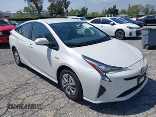 2016 Toyota Prius Four with VIN JTDKARFUXG3511034, listed as a IAAI auction lot 42137394 with 77,424 mi miles. Bid and sale history available at carsss.com. Image 1.