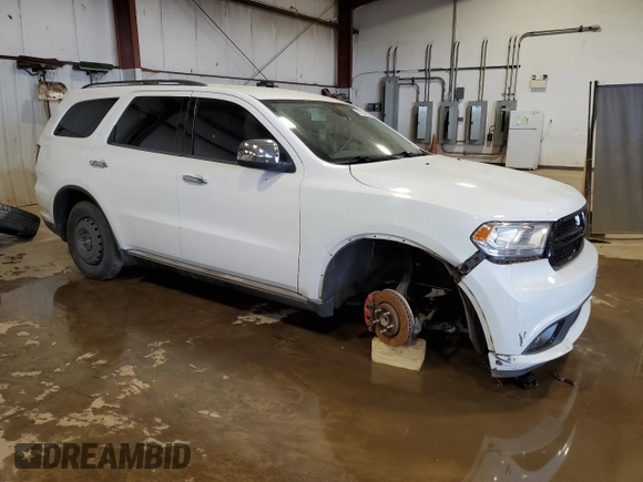 2015 Dodge Durango SXT with VIN 1C4RDHAG6FC789171, listed as a Copart auction lot 56335945 with 165,990 mi miles and Salvage title. Bid and sale history available at DreamBid. Image 4.