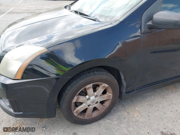 2011 Nissan Sentra 2.0 SR with VIN 3N1AB6APXBL677742, listed as a IAAI auction lot 41820050 with 204,475 mi miles. Bid and sale history available at carsss.com. Image 6.