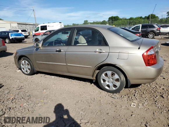 2006 Kia Spectra EX z VIN KNAFE121365269433, wystawiony jako Copart lot #56634735 z przebiegiem 86 551 mil mil oraz Szkoda całkowita • Salvage title. Historia ofert i sprzedaży dostępna na DreamBid. Obrazek 2.
