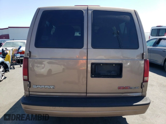 1996 GMC Safari z VIN 1GKDM19W3TB510312, wystawiony jako Copart lot #69528134 z przebiegiem 106 226 mil mil oraz Szkoda całkowita • Salvage title. Historia ofert i sprzedaży dostępna na DreamBid. Obrazek 6.