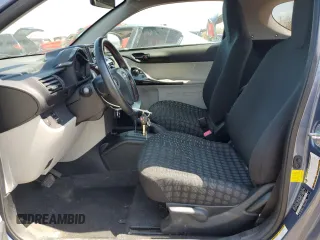 2012 Scion iQ z VIN JTNJJXB07CJ018481, wystawiony jako Copart lot #54014265 z przebiegiem 54 331 mil mil oraz Szkoda całkowita • Salvage title. Historia ofert i sprzedaży dostępna na DreamBid. Obrazek 7.