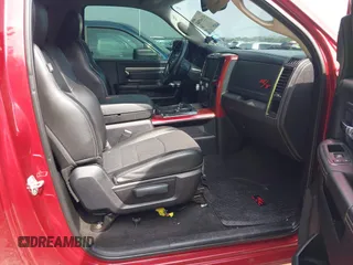 2014 Ram 1500 R/T with VIN 3C6JR6CT5EG153115, listed as a IAAI auction lot 41940587 with 142,323 mi miles. Bid and sale history available at carsss.com. Image 5.