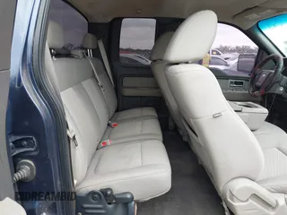 2009 Ford F-150 STX with VIN 1FTRX12889FA97356, listed as a IAAI auction lot 42121444 with 166,010 mi miles and . Bid and sale history available at DreamBid. Image 8.