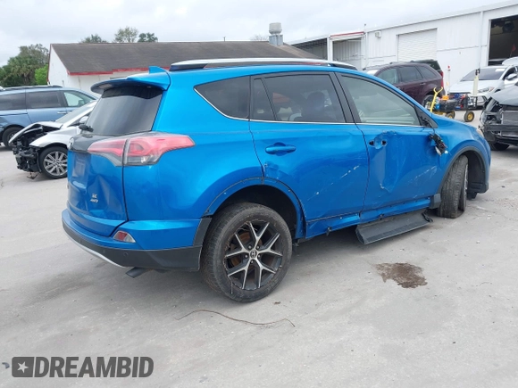 2016 Toyota RAV4 SE with VIN JTMJFREV3GJ076876, listed as a IAAI auction lot 41566899 with 133,216 mi miles and . Bid and sale history available at DreamBid. Image 4.