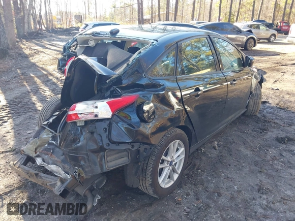 2018 Ford Focus SE with VIN 1FADP3F20JL218002, listed as a IAAI auction lot 41636952 with 90,059 mi miles and . Bid and sale history available at carsss.com. Image 4.