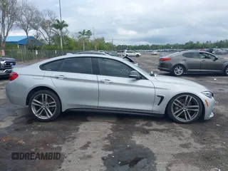 2018 BMW 4 Series 440i with VIN WBA4J5C57JBF07227, listed as a IAAI auction lot 41562986 with 76,316 mi miles and . Bid and sale history available at DreamBid. Image 13.