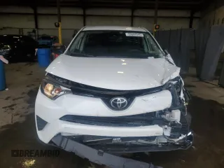 2018 Toyota RAV4 LE with VIN JTMBFREV2JJ182828, listed as a Copart auction lot 55668945 with 164,683 mi miles and Salvage Title. Bid and sale history available at DreamBid. Image 5.